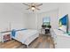 Comfortable bedroom with a desk, TV, and ample closet space at 13769 Old Creek Ct, Parrish, FL 34219