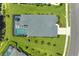 Community overview showcasing lakefront homes and landscaping at 13769 Old Creek Ct, Parrish, FL 34219