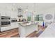 Spacious kitchen with large island, stainless steel appliances, and white cabinetry at 13769 Old Creek Ct, Parrish, FL 34219