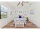 Bright bedroom with ceiling fan, and comfortable queen-size bed at 13769 Old Creek Ct, Parrish, FL 34219
