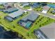 Community overview showcasing lakefront homes and landscaping at 13769 Old Creek Ct, Parrish, FL 34219