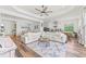 Spacious living area with sectional sofa and access to the backyard at 13769 Old Creek Ct, Parrish, FL 34219