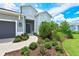 House exterior with landscaping and walkway at 13769 Old Creek Ct, Parrish, FL 34219