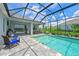 Relaxing screened pool and lanai with seating area, perfect for outdoor entertaining at 13769 Old Creek Ct, Parrish, FL 34219