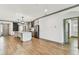 Modern kitchen is equipped with island, stainless steel appliances, and open design at 281 Villa Corte Dr, Lutz, FL 33549