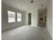 Spacious living area featuring freshly painted walls and lots of natural light at 318 W Park Ave, Tampa, FL 33602
