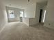 Bright landing featuring windows and access to the bedrooms upstairs at 318 W Park Ave, Tampa, FL 33602
