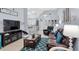 Inviting living room showcases an open layout, creating a seamless flow between the kitchen and seating area at 4474 Connery Ct, Palm Harbor, FL 34685