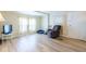 Living room with light flooring at 7154 El Meyers St, Zephyrhills, FL 33541