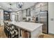Modern kitchen with white quartz countertops and gray cabinets at 281 Villa Corte Dr, Lutz, FL 33549