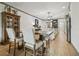 Dining area with farmhouse table and chairs near kitchen at 281 Villa Corte Dr, Lutz, FL 33549
