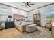Main bedroom with king-size bed and wood dresser at 281 Villa Corte Dr, Lutz, FL 33549
