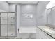 Bathroom with a large soaking tub, shower, and granite vanity at 4474 Connery Ct, Palm Harbor, FL 34685