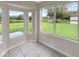 Breakfast nook with large windows offering a scenic view of the backyard at 4219 Bethpage Ct, Wesley Chapel, FL 33543