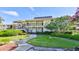 Two-story building with landscaping and stairs at 29129 S Bay Hollow S Dr # 3213, Wesley Chapel, FL 33543