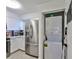 Convenient laundry closet with a stackable washer and dryer at 29129 S Bay Hollow S Dr # 3213, Wesley Chapel, FL 33543