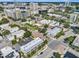 Stunning aerial view showcases the neighborhood's vibrant mix of residential and commercial areas at 201 6Th S St # 106, St Petersburg, FL 33701