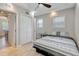 This bedroom features a ceiling fan, a closet and bright, natural light at 201 6Th S St # 106, St Petersburg, FL 33701