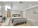 Bedroom with tiled floor, bench seating, recessed lights and a window at 201 6Th S St # 106, St Petersburg, FL 33701