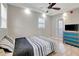 Bedroom with ceiling fan, recessed lighting, dresser and tiled floors at 201 6Th S St # 106, St Petersburg, FL 33701