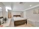 Bedroom with tiled floor, bench seating, recessed lights and a window at 201 6Th S St # 106, St Petersburg, FL 33701