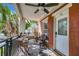 Inviting front porch offers a sitting area to relax outside and enjoy the scenery at 201 6Th S St # 106, St Petersburg, FL 33701