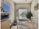 Cozy breakfast nook with natural light, a small table, and a view of the outdoors at 20308 Oak Key Ct, Tampa, FL 33647