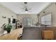 Cozy living room with lots of natural light, a large TV, and comfortable seating; great for Gathering movie nights at 20308 Oak Key Ct, Tampa, FL 33647