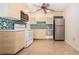 Modern kitchen with updated appliances and cabinetry at 1522 Belle Glade Ave, Sun City Center, FL 33573