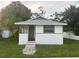 Quaint bungalow-style home with a white exterior at 2753 52Nd N Ave, St Petersburg, FL 33714