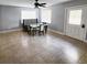 Bright dining area with built-in bench seating and tile flooring at 7006 N 18Th St, Tampa, FL 33610