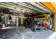 Garage with golf cart, shelving, and additional storage at 13716 18Th E Pl, Bradenton, FL 34212