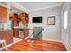 Modern kitchen with dark wood cabinets and granite countertops at 201 6Th S St # 106, St Petersburg, FL 33701