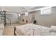 Finished basement bedroom with built-in shelving and tile flooring at 201 6Th S St # 106, St Petersburg, FL 33701