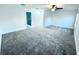 Large bedroom with gray carpeting and an en-suite bathroom at 4627 Castile S Way, St Petersburg, FL 33712