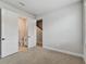 Bedroom with access to a half bathroom and stairs at 6605 N Nebraska Ave # 3, Tampa, FL 33604