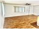 Large living room featuring wood-look floors and neutral walls at 9790 66Th N St # 196, Pinellas Park, FL 33782