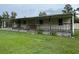 Single-story home with large covered porch at 17889 Thomas Blvd, Hudson, FL 34667