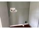 Small laundry room with washer and dryer hookups at 17889 Thomas Blvd, Hudson, FL 34667