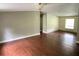 Bright living room with hardwood floors and neutral walls at 17889 Thomas Blvd, Hudson, FL 34667