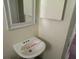 Small bathroom with a sink and mirror at 17889 Thomas Blvd, Hudson, FL 34667