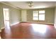 Spacious living room with hardwood floors at 17889 Thomas Blvd, Hudson, FL 34667