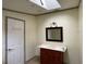Bathroom with vanity, mirror and skylight at 17889 Thomas Blvd, Hudson, FL 34667