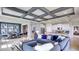 Open concept living room with kitchen and dining views at 4302 Pullet Ct, Lakewood Ranch, FL 34211