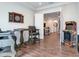 Game room with arcade game, dartboard, and seating area at 31982 Bourneville Ter, Wesley Chapel, FL 33543