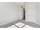 Bedroom featuring neutral carpet, natural light, and a view to the hallway at 11814 Richmond Trl, Parrish, FL 34219