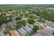 Aerial view of houses in a lush, green neighborhood at 1419 Trail Boss Ln, Brandon, FL 33511