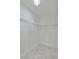 Walk-in closet with wire shelving and tile flooring at 16850 Whisper Elm St, Wimauma, FL 33598