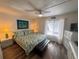 Spacious bedroom with king-size bed and coastal decor at 3730 42Nd S Way # H, St Petersburg, FL 33711