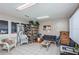 Bright community center room featuring comfortable seating, a bookshelf, and ample space for relaxation at 3730 42Nd S Way # H, St Petersburg, FL 33711
